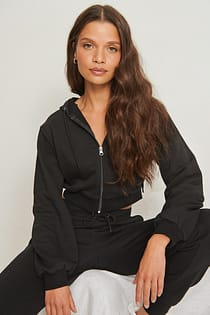 Ekologisk hoodie med dragkedjedetalj