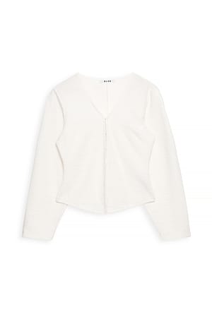 Offwhite Bouclé top med lange ærmer