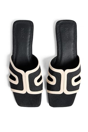 Slip in-sandal med kontrast