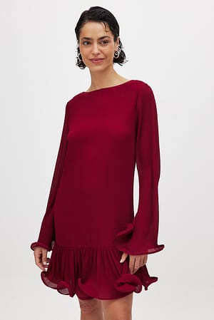 Minklänning med volanger