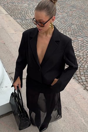 Korte boxy blazer met splitdetail