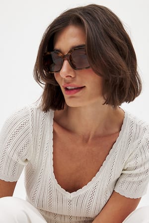 Offwhite Stickad pointelle-topp med kort ärm