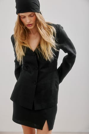 Black Blusa de lino con cintura de avispa