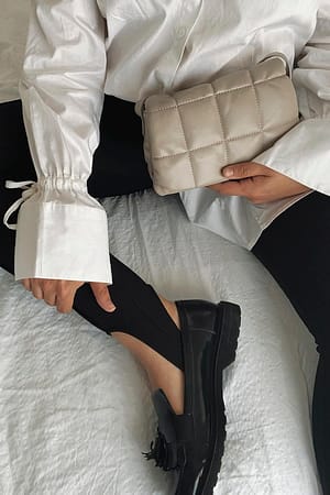 Zinc Mini gequilte puffy tas