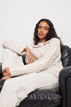 Beige Pull en maille torsadée