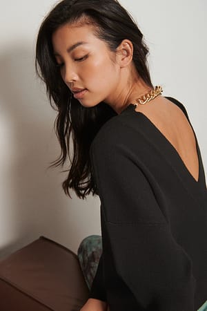 Black Recyclé pull en tricot à dos ouvert avec chaîne