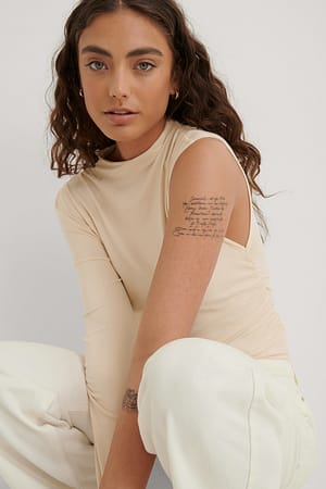 Beige Haut drapé asymétrique