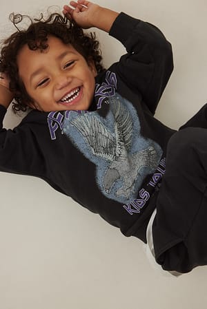 Black Organisches Sweatshirt in Washed-Optik mit Aufdruck