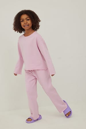 Pink Pantalon de jogging à bords bruts biologiques