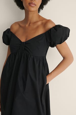 Black Organisches schulterfreies Minikleid