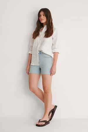 Light Blue Wash Organic Cotton Raw Edge Denim Shorts