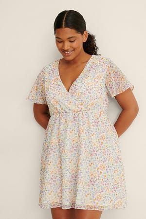 Floral Fling Overlap Sheer Mini Dress
