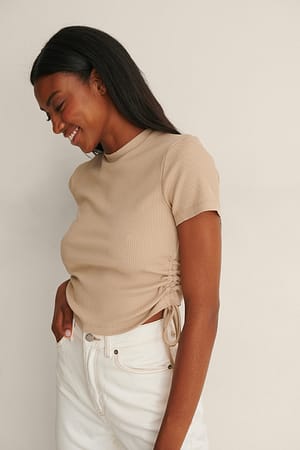 Beige Top met trekkoord en korte mouwen
