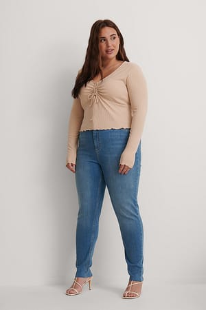 Mid Blue Økologiske skinny jeans med høyt liv og grov kant