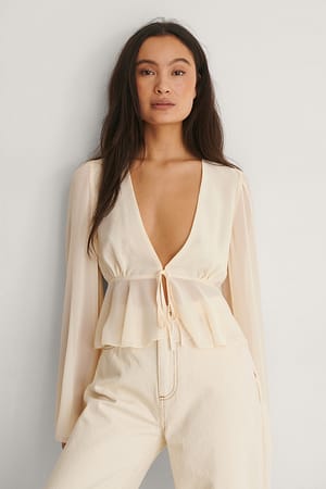 Cream Tie Front Trumpet Sleeve Blouse