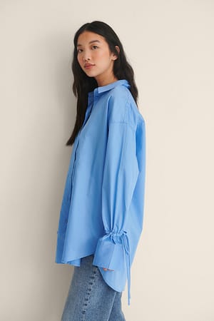 Light Blue Tied Sleeve Shirt