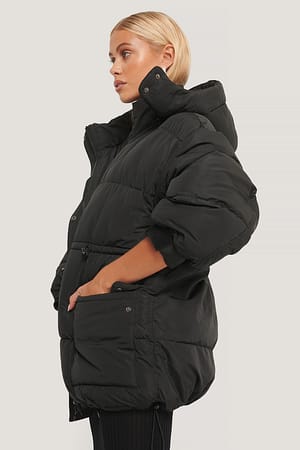 Black Gepolsterte Jacke Mit Kordelzug In Der Taille
