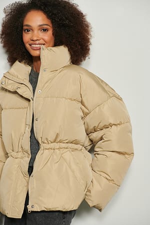 Beige gepolsterte Jacke