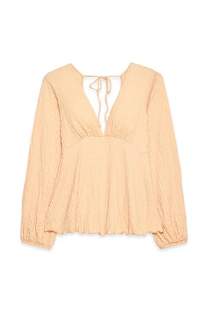 Apricot Bluse med ballonærmer og åben ryg
