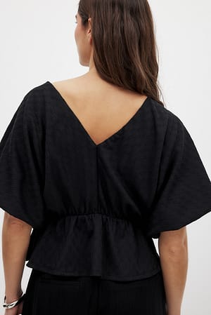 Black Peplumtop med drapering
