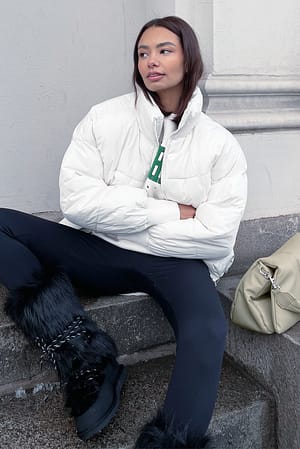 Offwhite Recycelte gefütterte Midi-Jacke mit Kordelzug