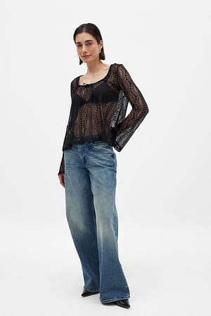 Black Top de encaje con mangas anchas