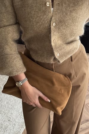 Tan Suede clutch bag with folding detail