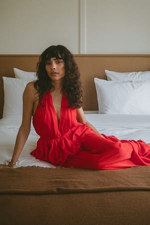 Spicy Red V Neck Ruffle Hem Top