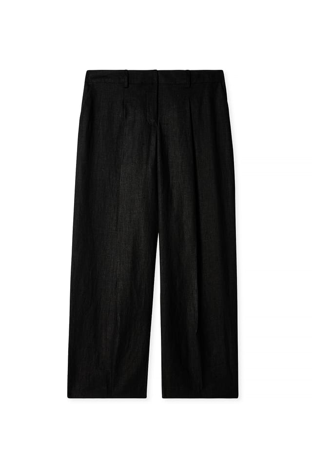 Black zulaufende Leinenhose mit mittlerer Taille