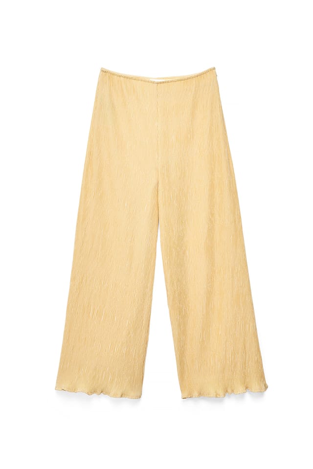 Light Yellow Strukturerade byxor med mellanhög midja