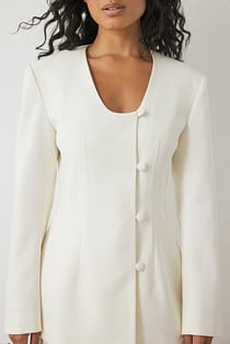 Tætsiddende blazer med rund hals