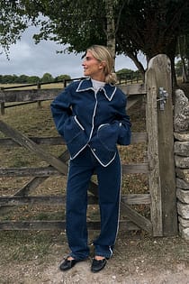 Jeans med blondedetaljer