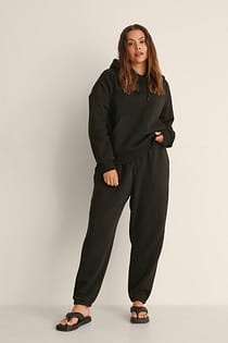 Ekologiska sweatpants med borstad yta och dragsko