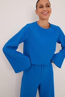 Geplooide blouse met trompetmouwen