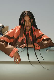 Veste en simili cuir à motif ondulé