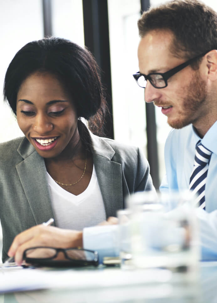 Stock photo of business people, happily doing business things