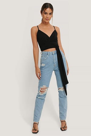 Mid Blue Jean Taille Haute Déchiré Aux Genoux