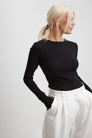 Black Ribbet top med lange ærmer og babylock