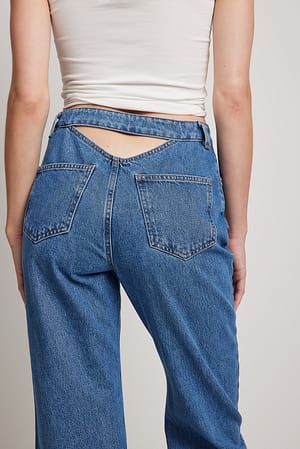 Mid Blue Denim med öppen ryggdetalj