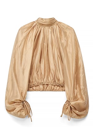 Beige Bluse med volum og ballongermer