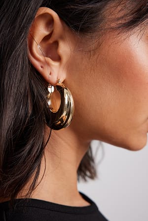 Gold Oorbellen met groot ringdetail