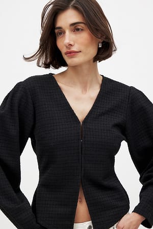 Black Bouclé-Oberteil mit langen Ärmeln