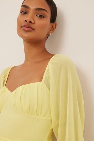Light Yellow Miniklänning med volangdetalj