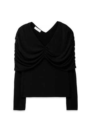 Black Top med flæser foran