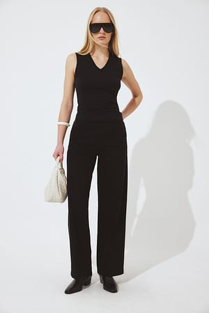 Black Vaqueros de talle alto con detalle de pliegues