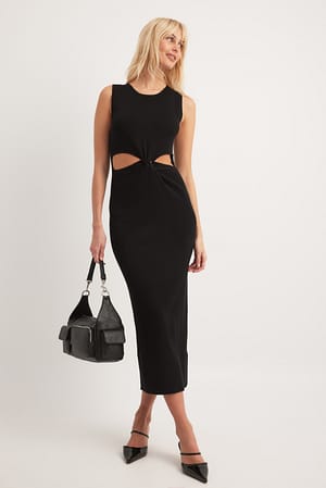 Black Robe mi-longue en maille à découpes