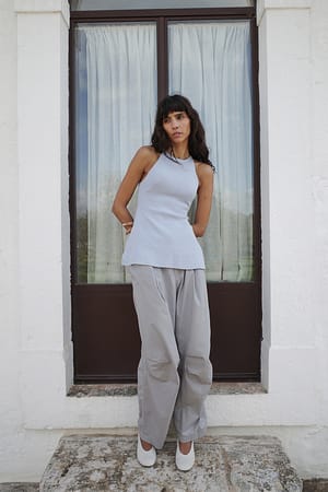 Light Blue Gebreide mouwloze top met split