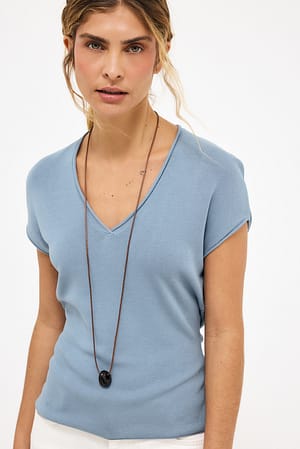 Light Blue Gebreide top met V-hals en korte mouwen