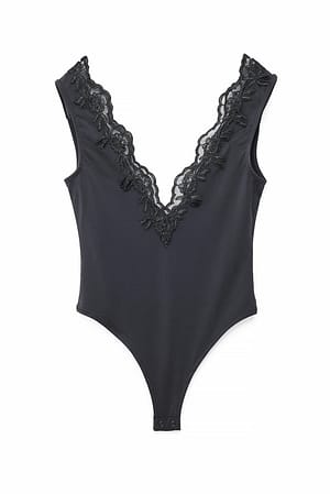 Black Body con inserciones de encaje