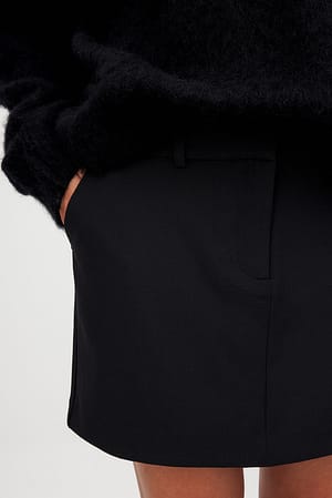 Black Minirok met riemlusdetail